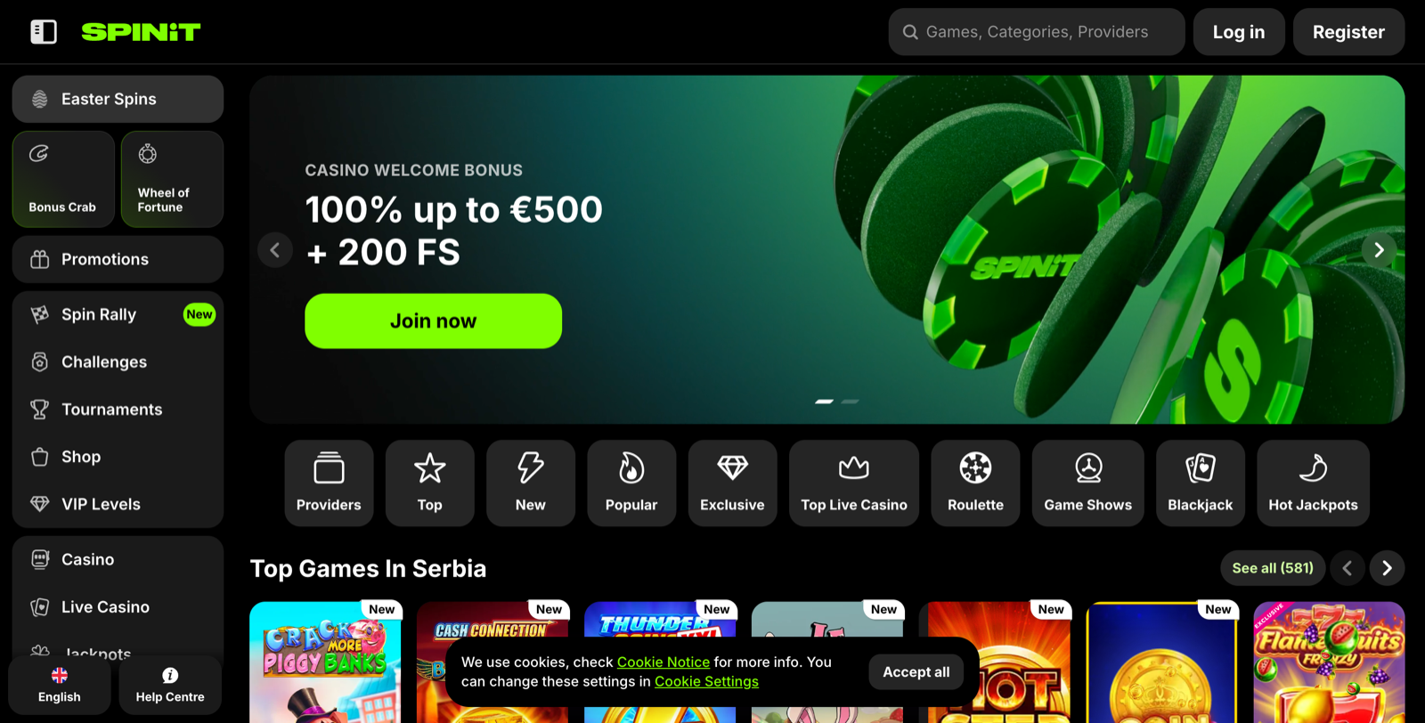 Spinit homepage hero with welcome bonus and category rail.