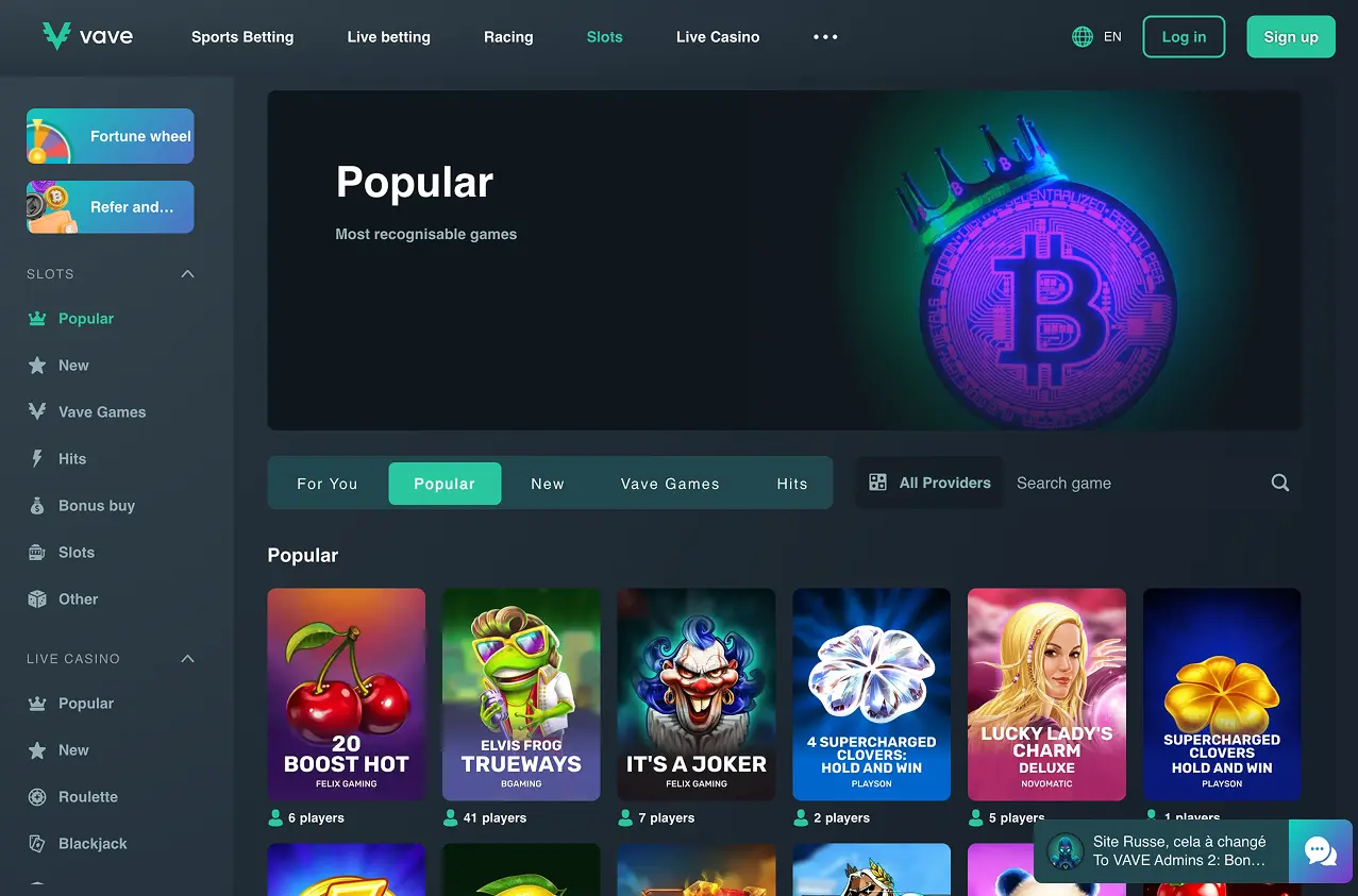 Vave homepage showing sportsbook, live betting, racing, slots, and live casino navigation with slot categories and provider filters